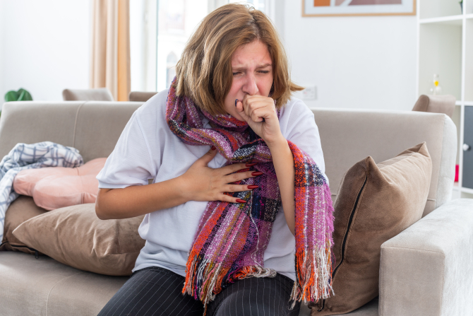 2. -imagine fara descriere- (unhealthy-young-woman-with-warm-scarf-around-neck-feeling-terrible-suffering-from-virus-coughing-sitting-couch-light-living-room_87829800.jpg)